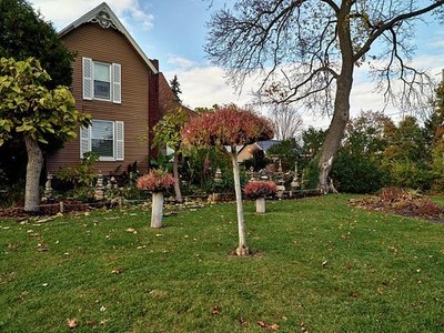 Photo:Fenton Michigan Stewart Melrose Garden 2019 Cairns Rock Sculptures