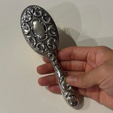 Vintage ornate silver-tone vanity hair brush