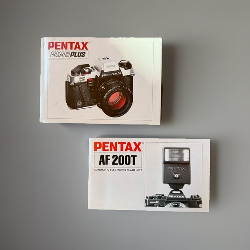 Cámara Pentax Program Plus 35 mm con lente, cordón y flash AF200T - negra y plateada - Imagen 22 de 22