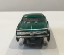 Vintage Aurora T-Jet  67 Candy Green Camaro SS open rivet chassis.