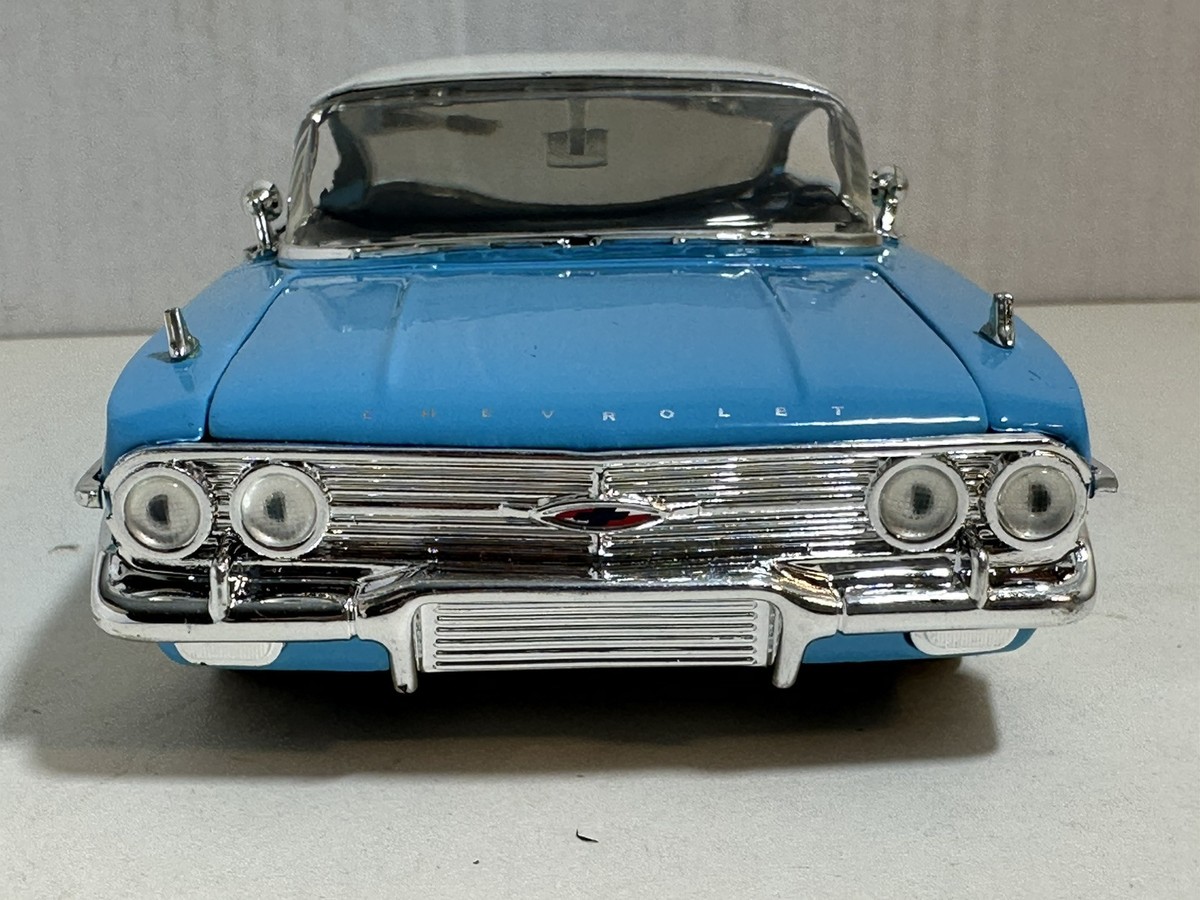 JADA SHOWROOM FLOOR 1960 CHEVY IMPALA BLUE 1:24 DIECAST MODEL CAR