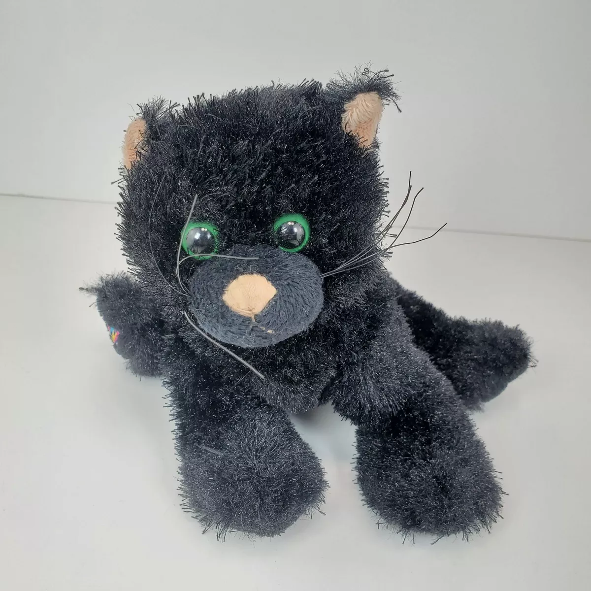 Black cat with green eyes stuffed animal hotsell