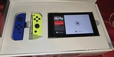 Console Nintendo Switch avec une Paire Joycons Bleu Et Jaune - Bon etat