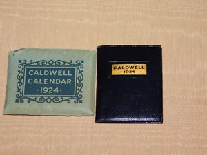 VINTAGE 2 1/8" X 1 3/4" CALDWELL JEWELS GOLDWARE PHILADELPHIA 1924 MINI CALENDAR