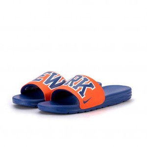 orange and blue nike slides