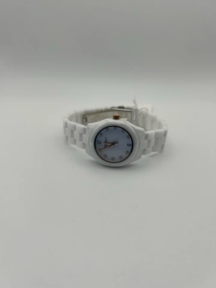 Reloj analógico redondo con esfera de oro rosa blanco Bulova Caravelle para mujer Foto 3 de 4