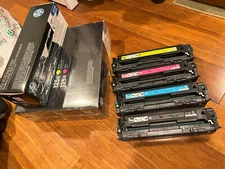 Set of 8 (4 new, 4 used) HP Laserjet 125A Genuine OEM Laser Toner Cartridges