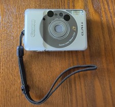 Cámara de bolsillo compacta de colección Canon ELPH JR película Advantix 1997 con estuche PROBADA