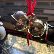 Father Christmas Magic Alarm bells.  Shiny antique gold bells+red satin ribbon.