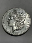 1887 Morgan Silver Dollar About Uncirculated Plus