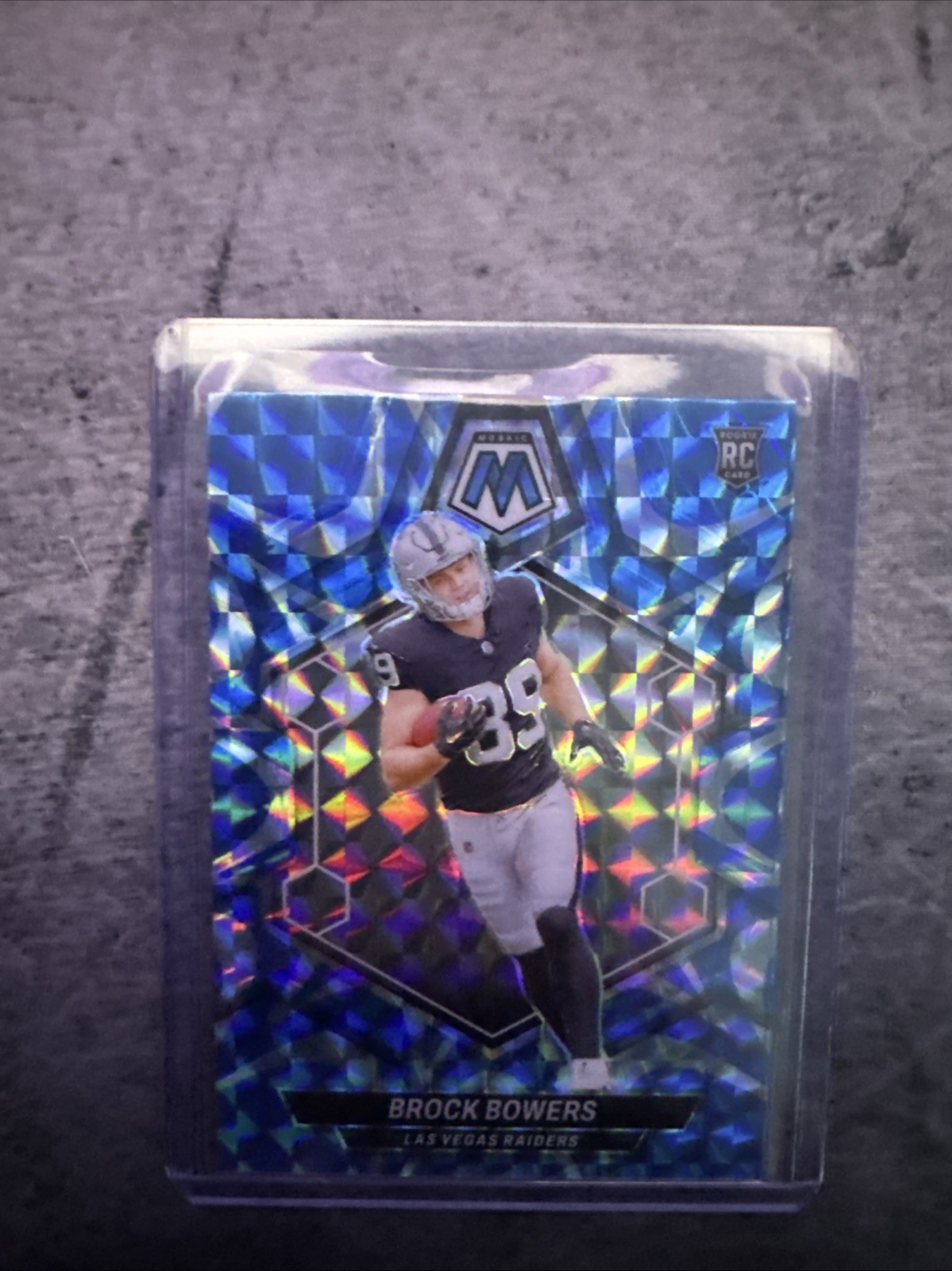 2024 Panini Mosaic - Rookies Brock Bowers #313 Reactive Blue Mosaic Prizm (RC)