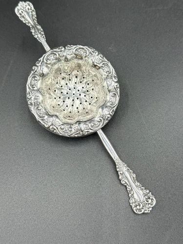 REVERE BY INTERNATIONAL  SILVER STERLING SILVER TEA STRAINER/ WITH NO MONOGRAM