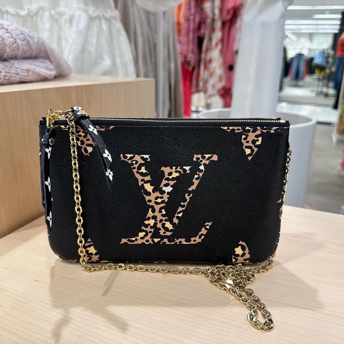 Printed Louis Vuitton dual zipper bags