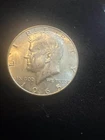 1965 KENNEDY HALF DOLLAR AND 1968 DENVER MINT VERY COLLECTIBLE