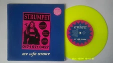 My Life Story - Strumpet - 1997 Dayglo yellow 7" Vinyl Single in pic