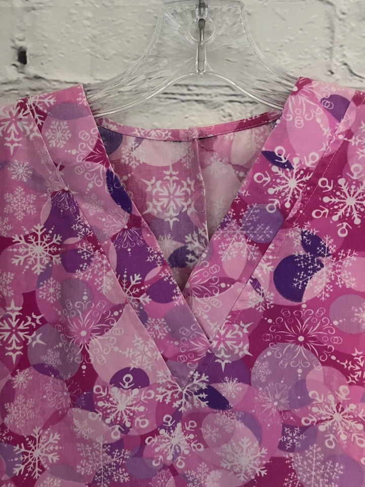 Unbranded Pink Snowflake Themed Scrub Top Women's Size XS - Image 2 of 4