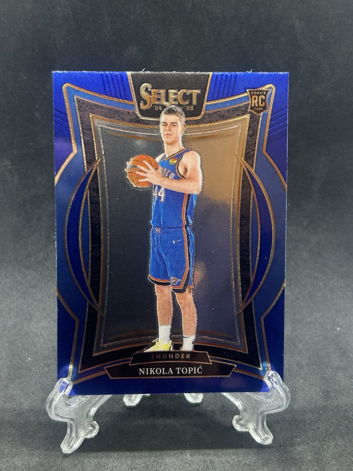 2024-25 Panini Select - Blue Concourse Prizm #89 Nikola Topic (RC) - OKC Thunder