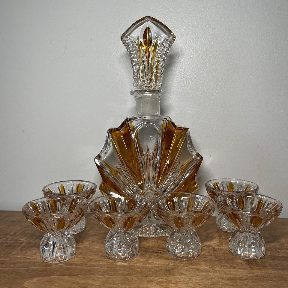 A complete Art Deco glass-and-decanter set — the kind of thing you'd find in a grand old estate and immediately want to display.