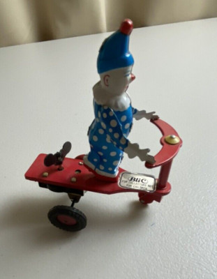 Retro Tin Litho Wind-Up Toy Clown Riding Scooter - works