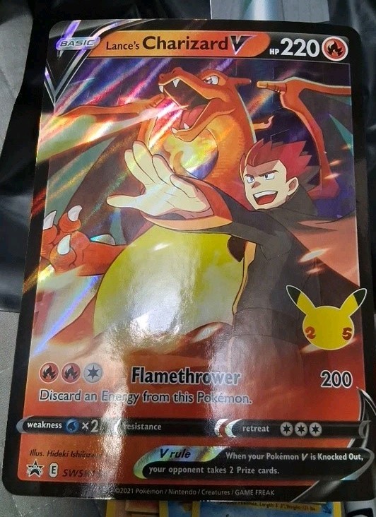 Pokemon TCG Lance's Charizard V SWSH133 Celebrations 25th Black Star Promo NM
