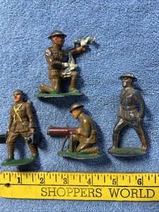 (4) BARCLAY TIN HELMET SOLDIERS (4)