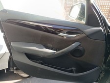 E2J79X LINKE VORDERT�RVERKLEIDUNG / 1028212 F�R BMW X1 E84 SDRIVE 18 D