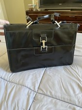 Vintage Black Leather Hand Bag. Zippered Silver Tone Hardware.