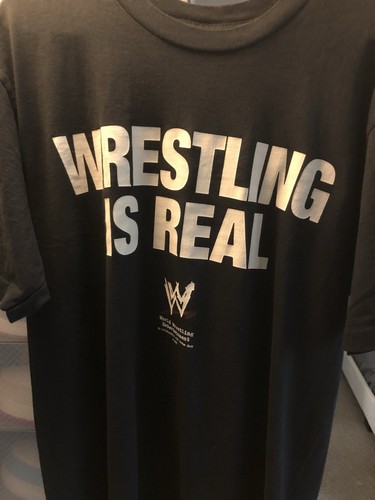 Travis Scott, The Rock, John Cena X WWE “Wrestling Is Real” T-Shirt LARGE