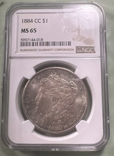 1884 CC MORGAN SILVER DOLLAR NGC MS65; Beautifully Toned; Gem Beauty.