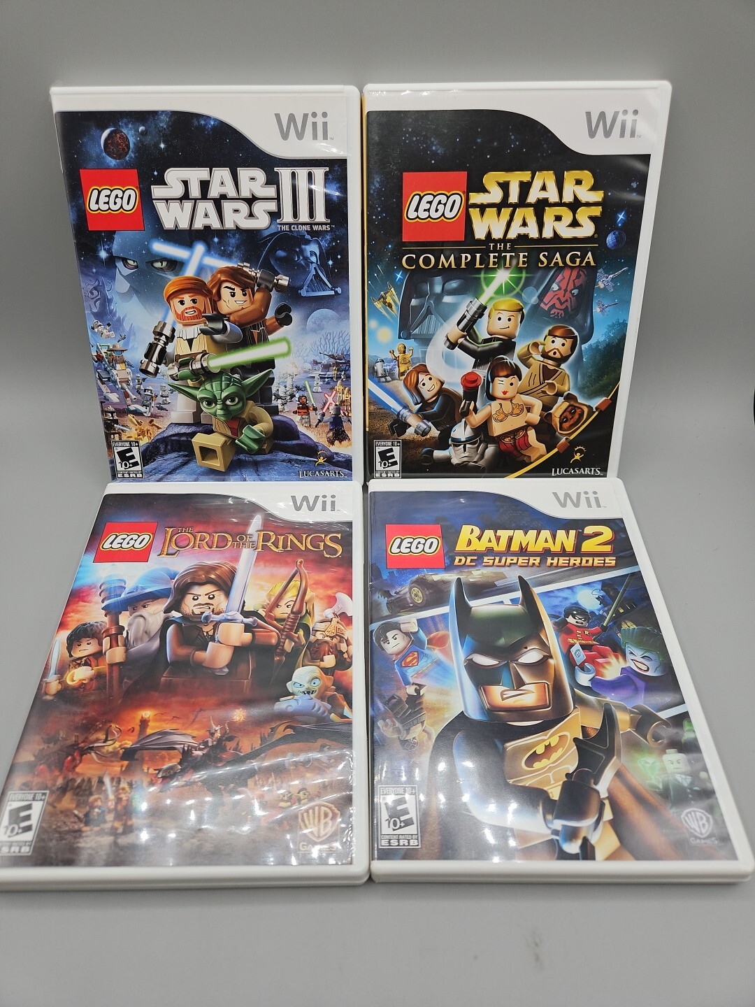 LOT OF 4 NINTENDO WII LEGO GAMES STAR WARS 3 SAGA BATMAN 2 LORD OF