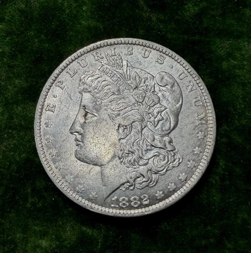 1882-O/S Morgan Silver Dollar Choice AU+