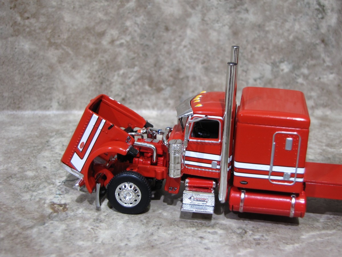 DCP 1/64 Can't Afford It Ganski Red Peterbilt 389 Utility