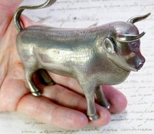Vintage St. Lukes Ox Sterling Silver .999 Hand Engraved Kinetic Tail Figurine