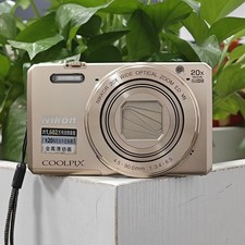 English Nikon COOLPIX S7000 16.0MP Compact Digital Camera Gold 20x Zoom w/ Wifi