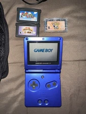 Nintendo Game Boy Advance SP with Charger Cable, OEM Trade Cable, and Games