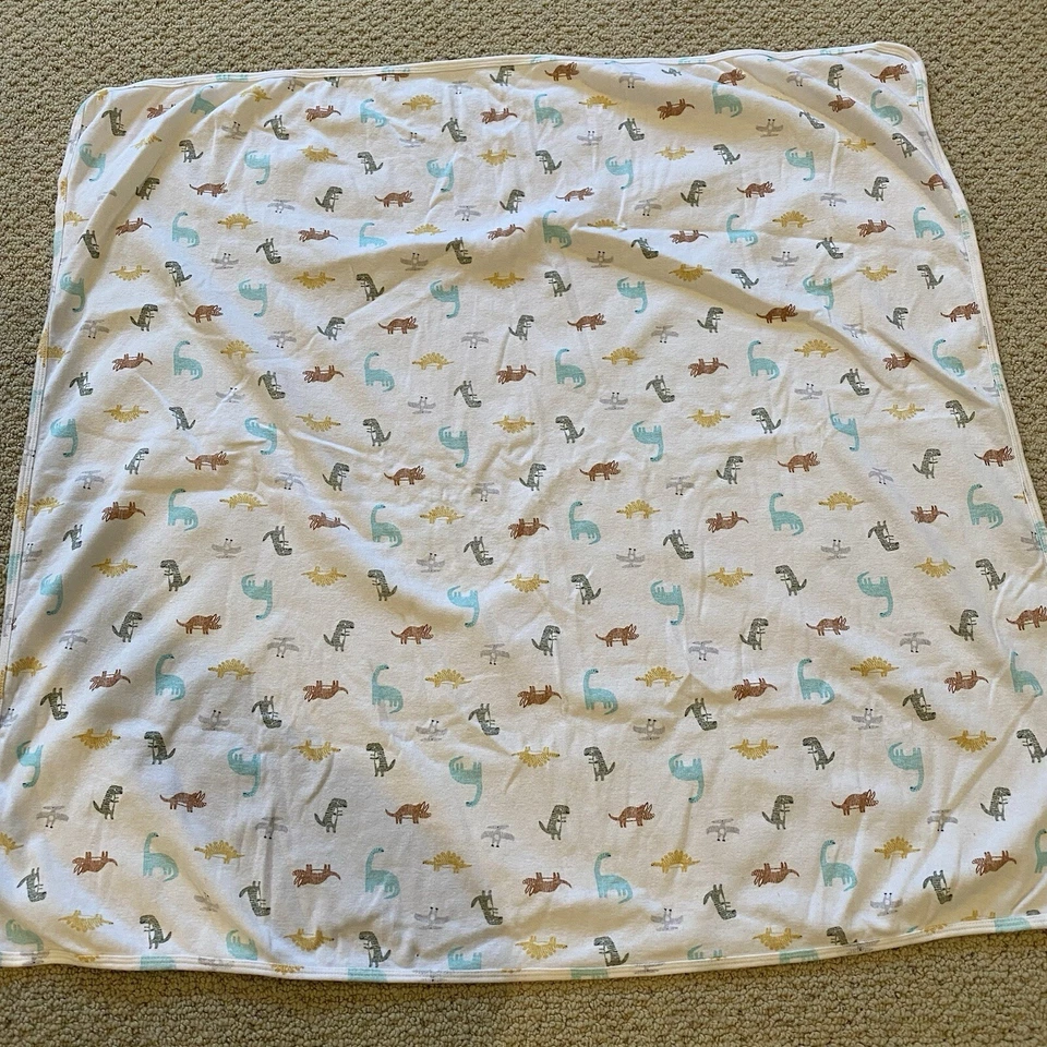 Manta de bebé Carters dinosaurio algodón blanco azul amarillo marrón jersey tejido envoltura Foto 3 de 4