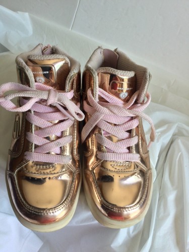 gold colored tennis shoes