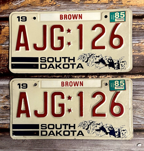 1985 South Dakota License Plate Matched Pair / Set AJG 126 - Mount Rushmore