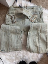 PrettyLittleThing Green Flare Jeans High Rise...