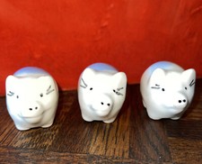 Three Ceramic Small Pigs White With Blue Backs Almost Identical But Not Quite