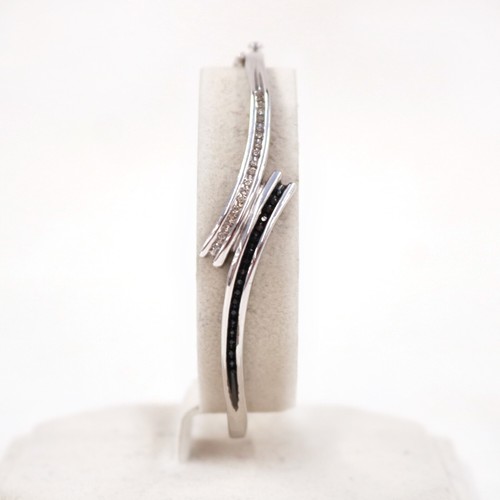 Sterling Silver and Melee Black and White Diamond Crossover Bracelet - Picture 8 of 12