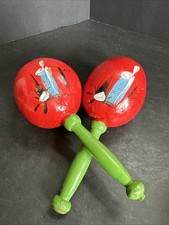 A Pair Of Vintage Style Hand Painted Mexican Maracas