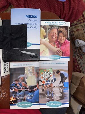 Miracle Ear box, manuals, brushes 