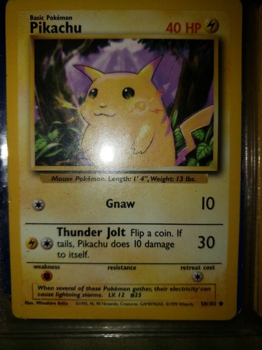 RARE 1999 Pikachu, yellow cheek, purple background 58/102 card | eBay