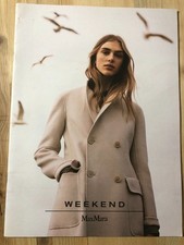 Catalogo Moda donna Weekend MaxMara (modella con cappotto e gabbiani)