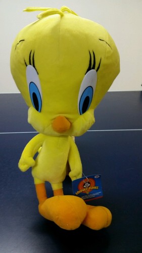 A new Looney Tunes Tweety bird. The size is about 19" tall, 10" width & 8"thick