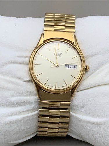 Vintage Seiko Quartz 7N43-8A89 Men’s Gold Tone Date Day Watch New Batt