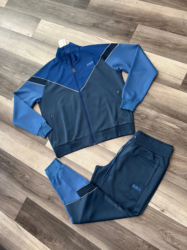 NUEVO CON ETIQUETAS CHÁNDAL PUMA HOMBRE 2 PIEZAS LAUREN LONDRES AZUL GRIS OSCURO TALLA PEQUEÑA Foto 3 de 4
