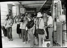 1979 Press Photo Fogbound passengers at Boston Logan Airport board Hartford bus