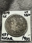 KEY 1879-CC CLEAR, MORGAN SILVER DOLLAR, VF+ details and toned.